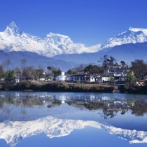 Reflection of mountains in a lake, Fewa Lake, Pokhara, Nepal